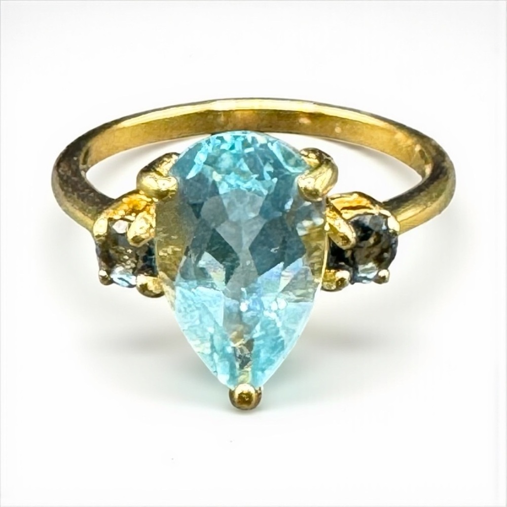 Gold Tone Ring with Blue Topaz Gemstone